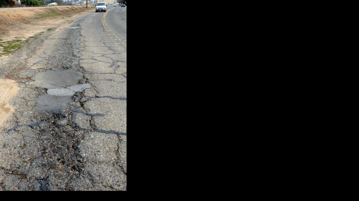 
Potholes, cracks and broken pavement cover much of Fruitland Road between Shaffer Road and Winton Parkway in Atwater.
