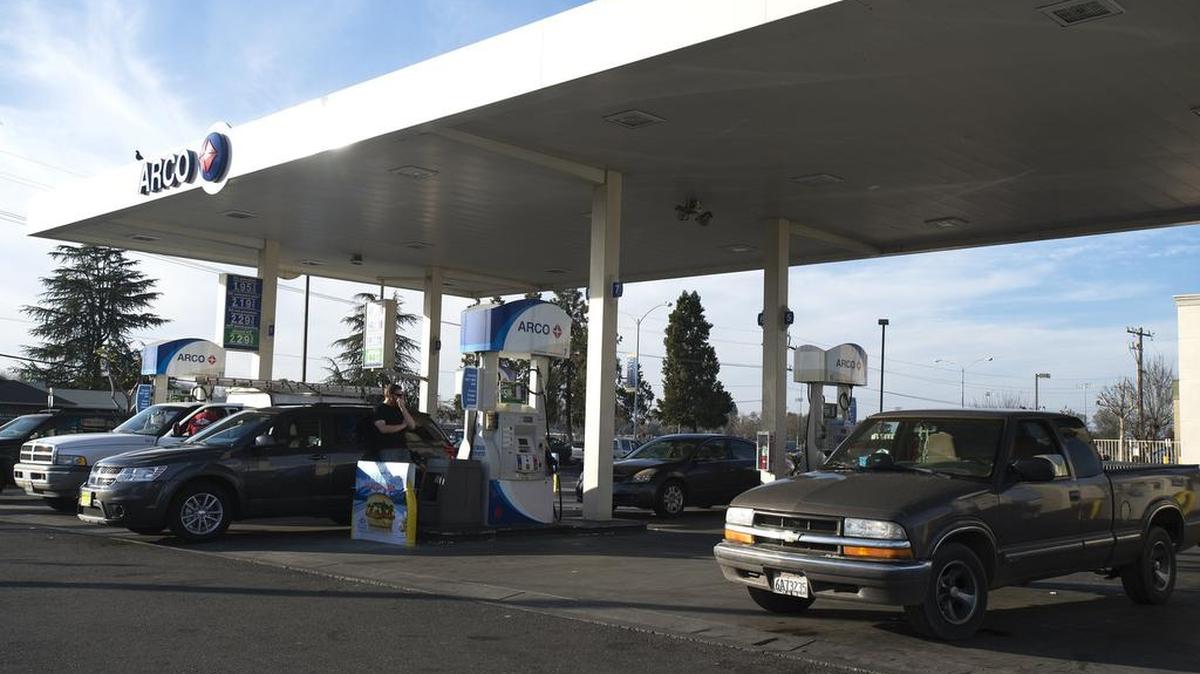 Motorists pump gas at the Arco gas stain at G Street and Olive Avenue in Merced on Tuesday, Feb. 9, 2016. A state panel was told Monday that California gas prices are significantly higher than the national average.