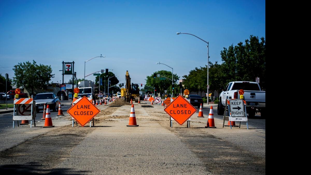 
Construction along R Street forces traffic to one lane in both directions in Merced late last month. The Merced Engineering Department said the road Friday was closed to all traffic between Main and 20th streets and will remain so until July 3. 
