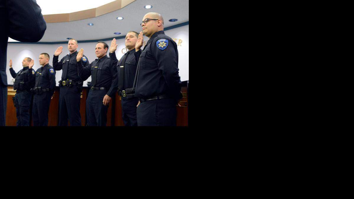 
Five full-time officers and a reserve officer are sworn in by Atwater Mayor Jim Price during a ceremony Thursday at City Hall. That brings the total number of officers to 32, according to police Chief Frank Pietro.
