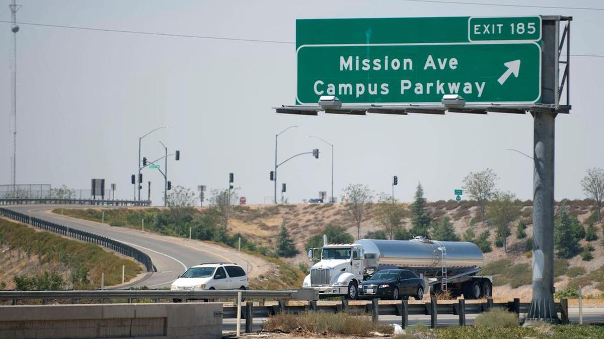 
Cars and trucks travel along Highway 99 near the Campus Parkway exit in Merced on Tuesday. Merced City Council moved a project forward this week that would put a 77-acre retail center along the parkway.
