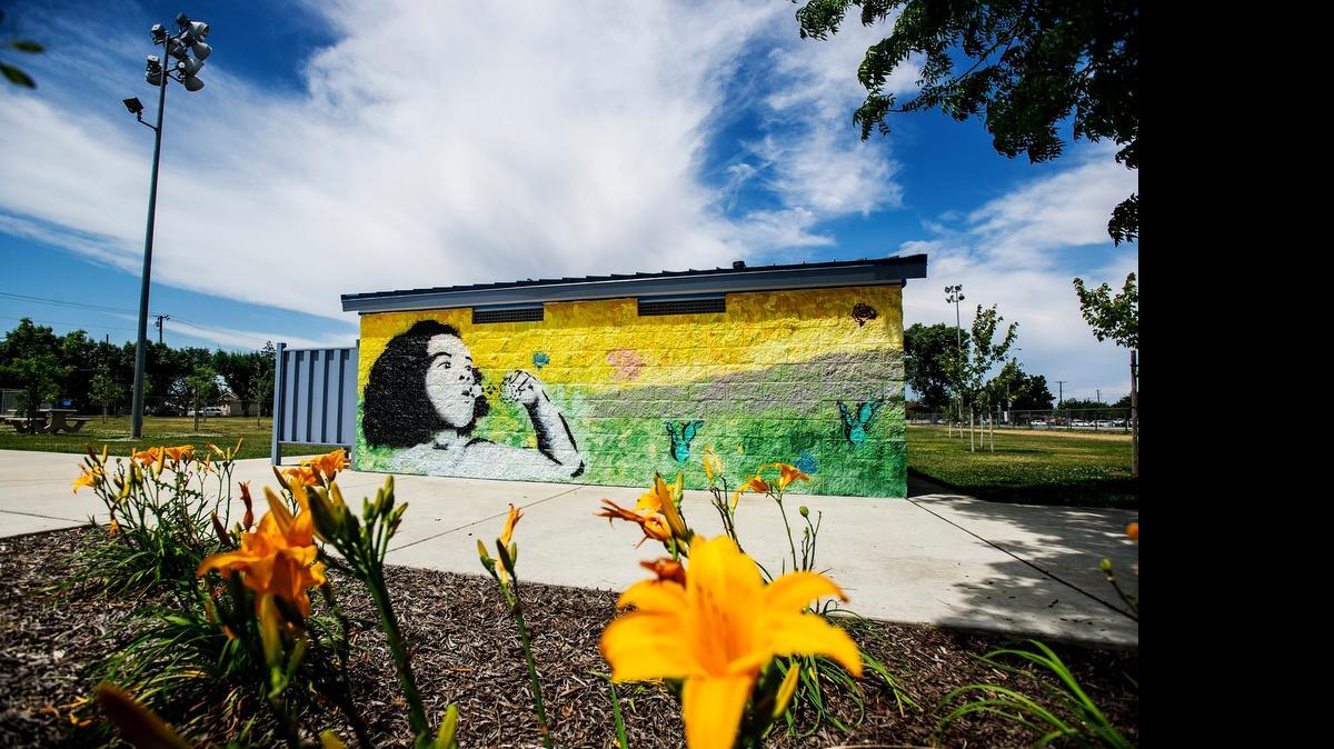 
A mural created by the UC Merced Arts and Global Arts Studies Program with help from members of the community at McNamara Park in Merced is seen June 6. A dedication ceremony and celebration is planned from 10 a.m. to 1 p.m. Saturday at the 1040 Canal St. park. 
