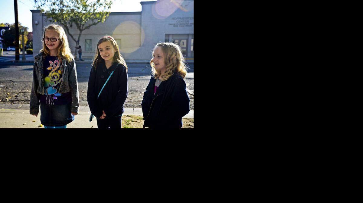 
 Elsa Van Dyke, from left, Emma Dickson and Georgia Lodwick, all 8,  held a bake sale and earned $557.10, which they donated to the Merced County Rescue Mission to help feed the less fortunate. 
