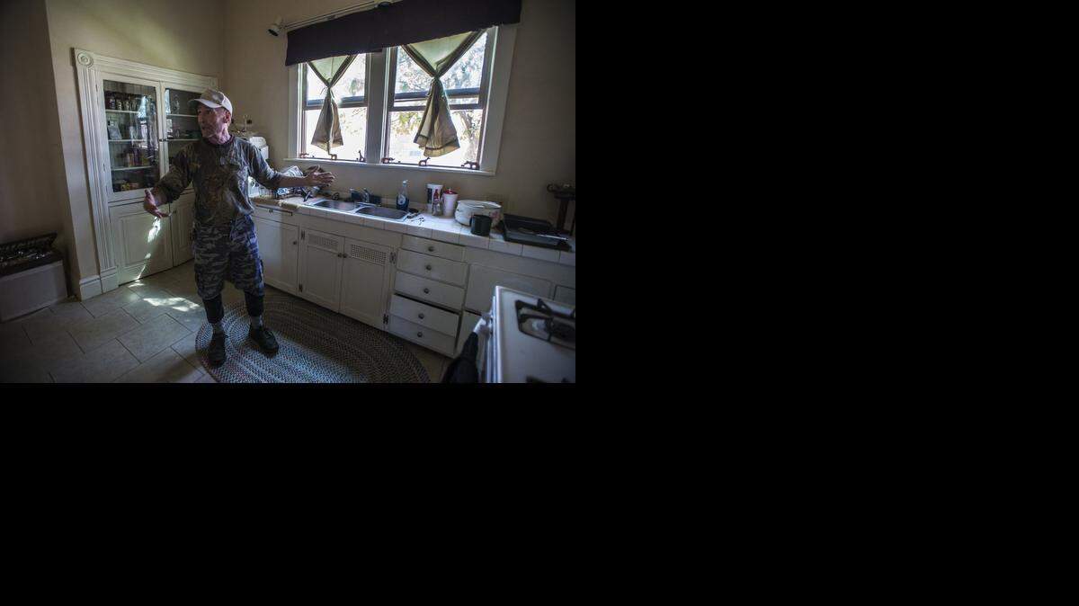
Formerly homeless veteran Ken Roark, 54, of Merced talks about the kitchen in his new home in Merced on Tuesday. 
