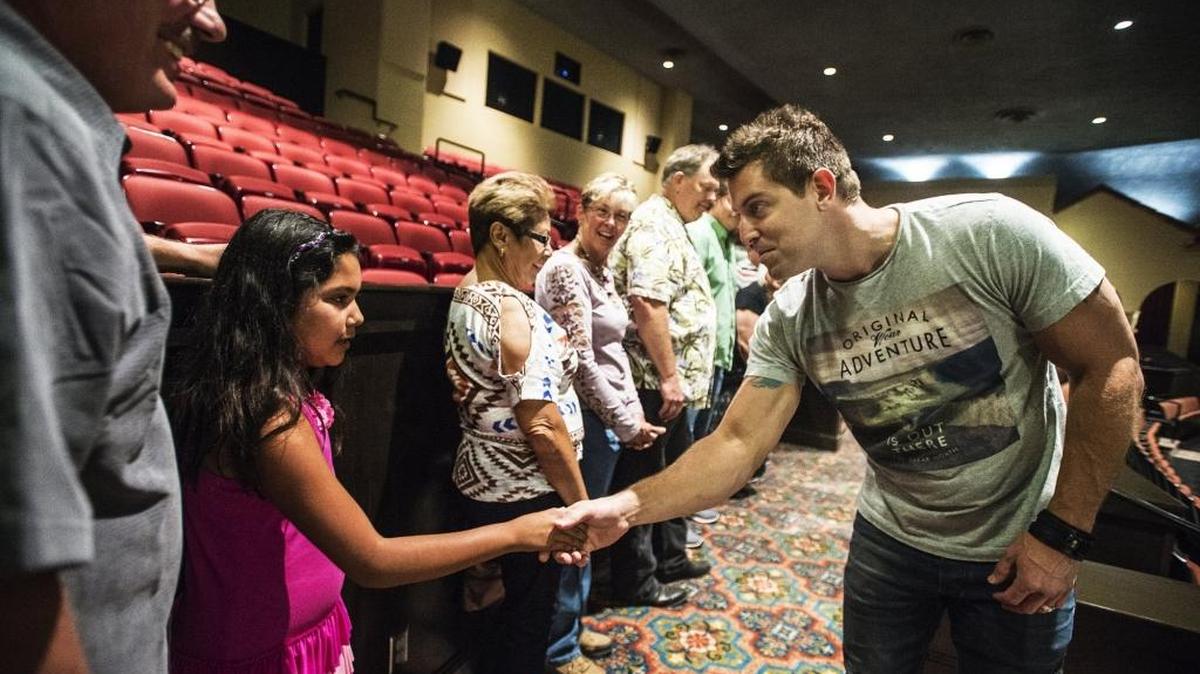 
Contemporary Christian musician Jeremy Camp, right, shakes hands with 9-year-old Merced resident Miley Hyer and her father Jim Hyer, 54, during a meet- and- greet with fans at the Merced Theatre prior to his show Thursday.
