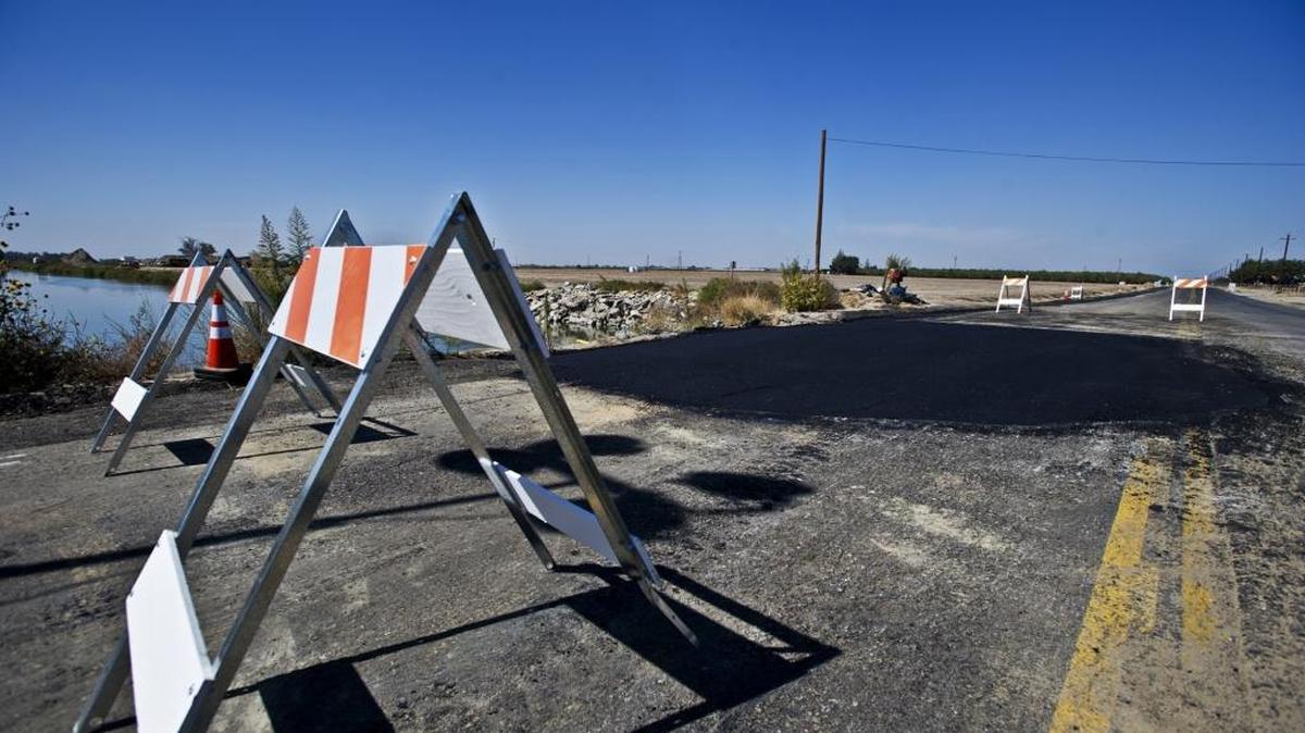 California Department of Transportation crews work to repair a sinkhole which opened up over an irrigation waterway along highway 165 near Stevinson, Calif., in September. About 71 percent of likely voters would support a half-cent sales tax that would generate about $15 million a year across the county, according to the survey delivered this month from San Mateo-based Godbe Research, a firm hired by Merced County Association of Governments.