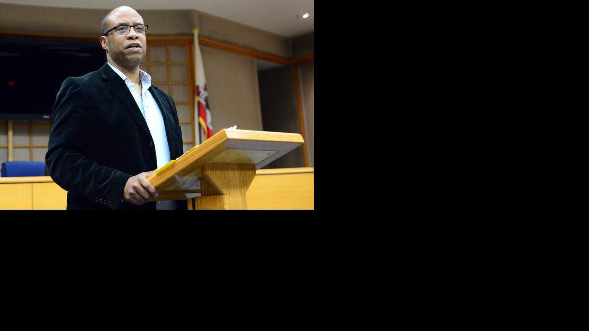 
Darryl Davis, 50, speaks at Merced City Hall after being sworn in as the new president of the local branch of the National Association for the Advancement of Colored People on Thursday.
