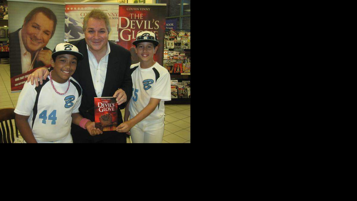 
Author Louis Agnello Jr., shown here with two young fans, will be at a book signing 10 a.m. to 5 p.m. Thursday at Second Time Around Books, 524 W. Main St., Merced.
