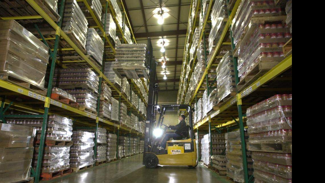 
Residents are speaking out against a Safeway bottling plant in Merced that’s pumping groundwater from city wells to be bottled and sold. In this file photo, forklift driver Walter Fernandes is seen inside the Safeway plant in Merced.
