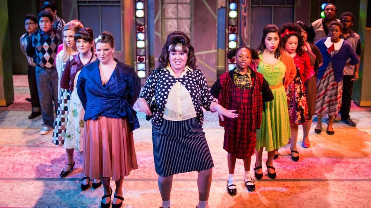 Actors perform during a recent dress rehearsal of “Hairspray,” now playing at Playhouse Merced. The Saturday show is a benefit for Valley Crisis Center, which advocates for victims of sexual and domestic violence and human trafficking.