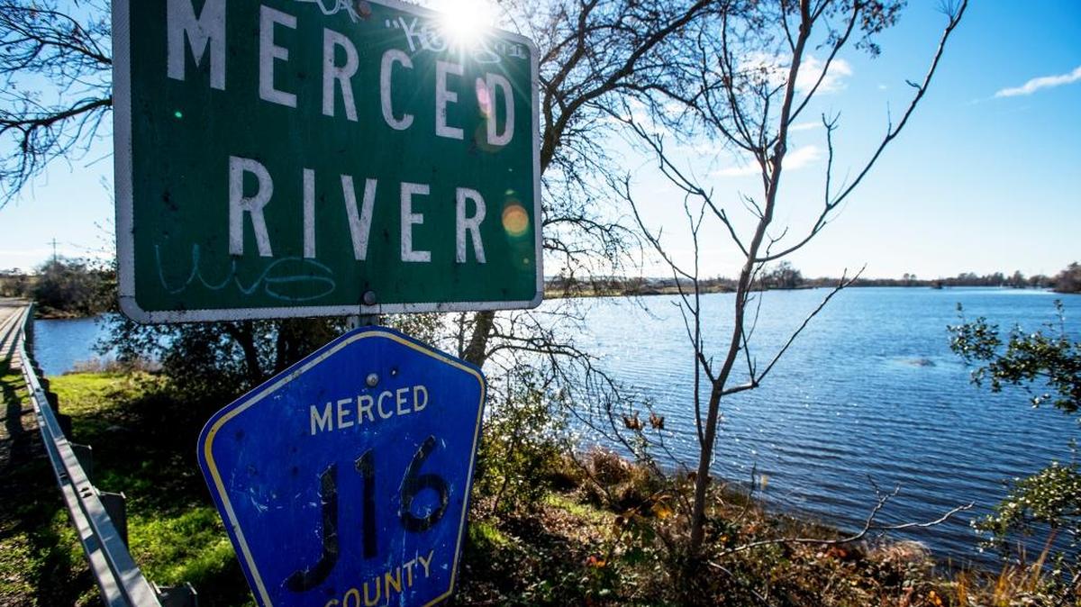 The Merced River is seen from Hornitos Road in Snelling on Thursday. The National Weather Service predicts the area could receive up to 3 inches of rain over the weekend, which may cause local rivers and waterways to overflow their banks.