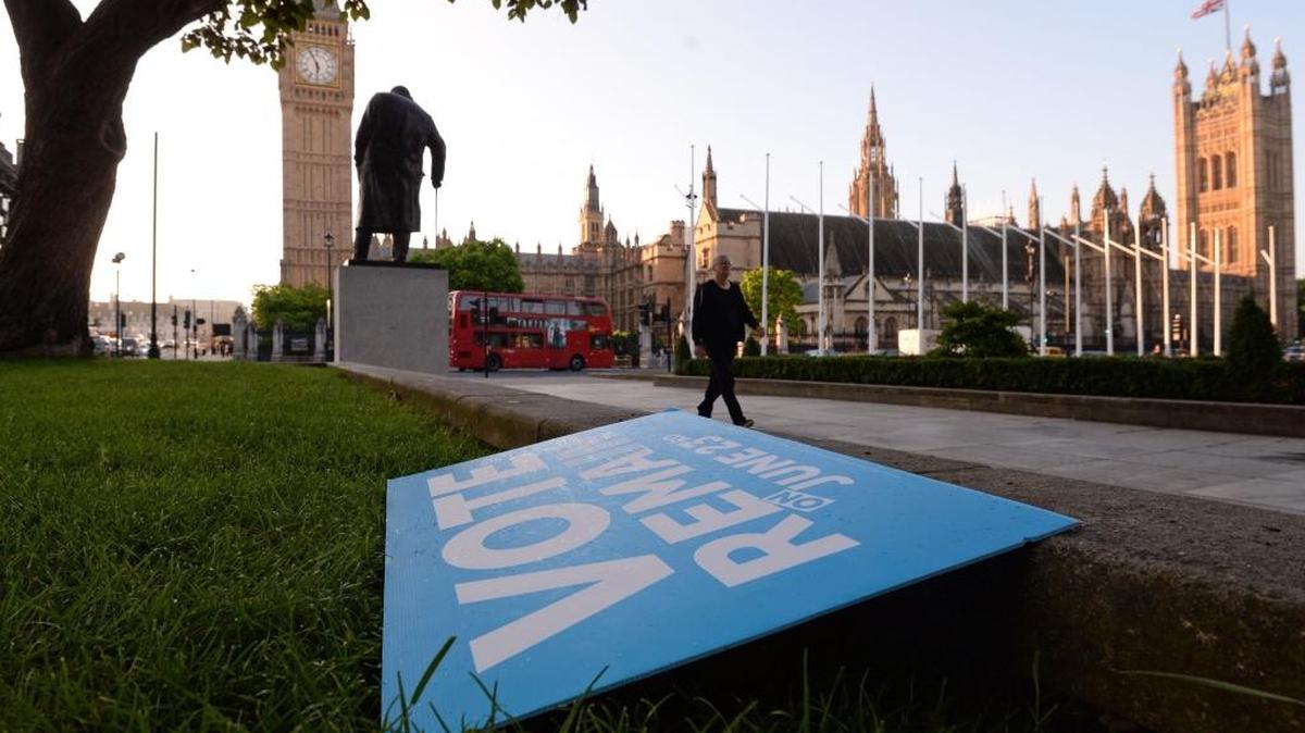 A poster backing continued British membership in the European Union lies discarded Friday, June 24, 2016, in London’s Parliament Square.