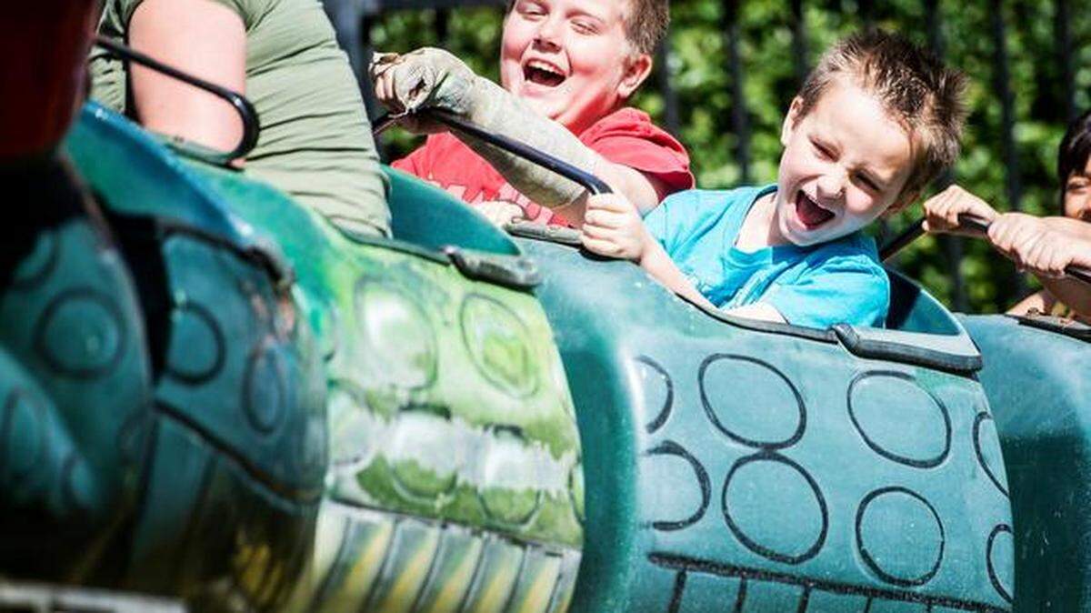 Jacob Bissell, 9, center, and James Craig, 6, both of Merced, enjoy the Go-Gator ride at Kiddieland on April<133>4 after the Kiwanis Club Easter Egg Hunt.<252><137>following the 25th annual Kiwanis Club of Greater Merced Easter Egg Hunt at Applegate Park in Merced, Calif., Saturday, April 4, 2015. Merced Golden Valley and Livingston Key Club members filled thousands of plastic eggs with candy and receipts for prizes.<252><137>