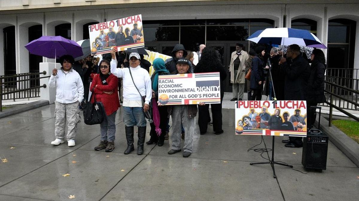 Members of the Merced Organizing Project and PICO National Network’s coalition Faith in the Valley hold a rally asking President Barack Obama and local officials to protect undocumented families Thursday in front of the Merced County Administration Building on Thursday, Dec. 15, 2016.