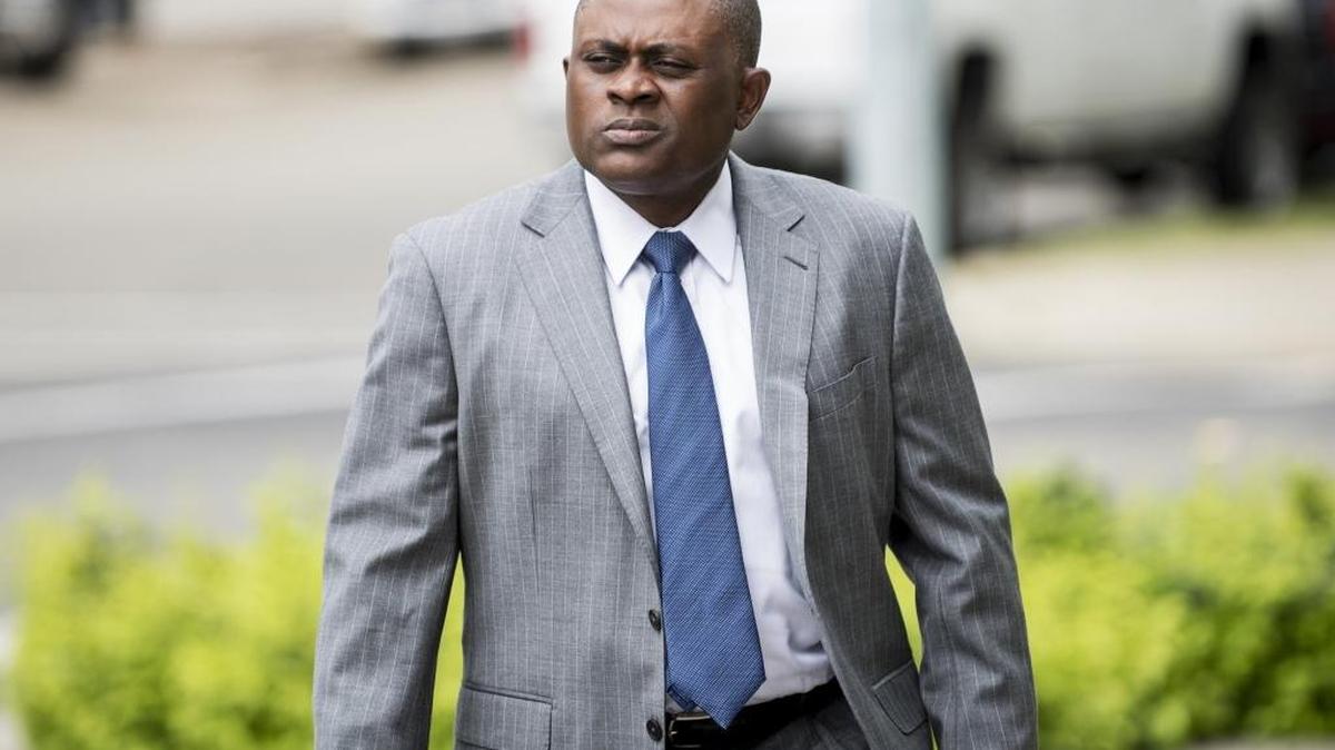 Doctor Bennet Omalu enters the Merced County Superior Courthouse in Merced, Calif., on Tuesday, April 11, 2017. Omalu, a neuropathologist portrayed in the 2015 film "Concussion" for identifying chronic traumatic encephalopathy in professional football players, is testifying as an expert witness in the trial of Andrew Sanchez, a Gustine man accused of murder and child abuse in the March 2015 death of his 9-month-old son Maddix Ramsour. Sanchez told detectives that Maddix suffered fatal injuries when he rolled off a 2-foot-high bed during a diaper change. Maddix died while undergoing brain surgery.