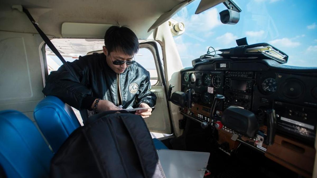 Sierra Academy of Aeronautics student Stan Ley, 32, of South Korea prepares for a flight with an instructor in a Cessna 152 airplane at Castle Airport in Atwater on Thursday.