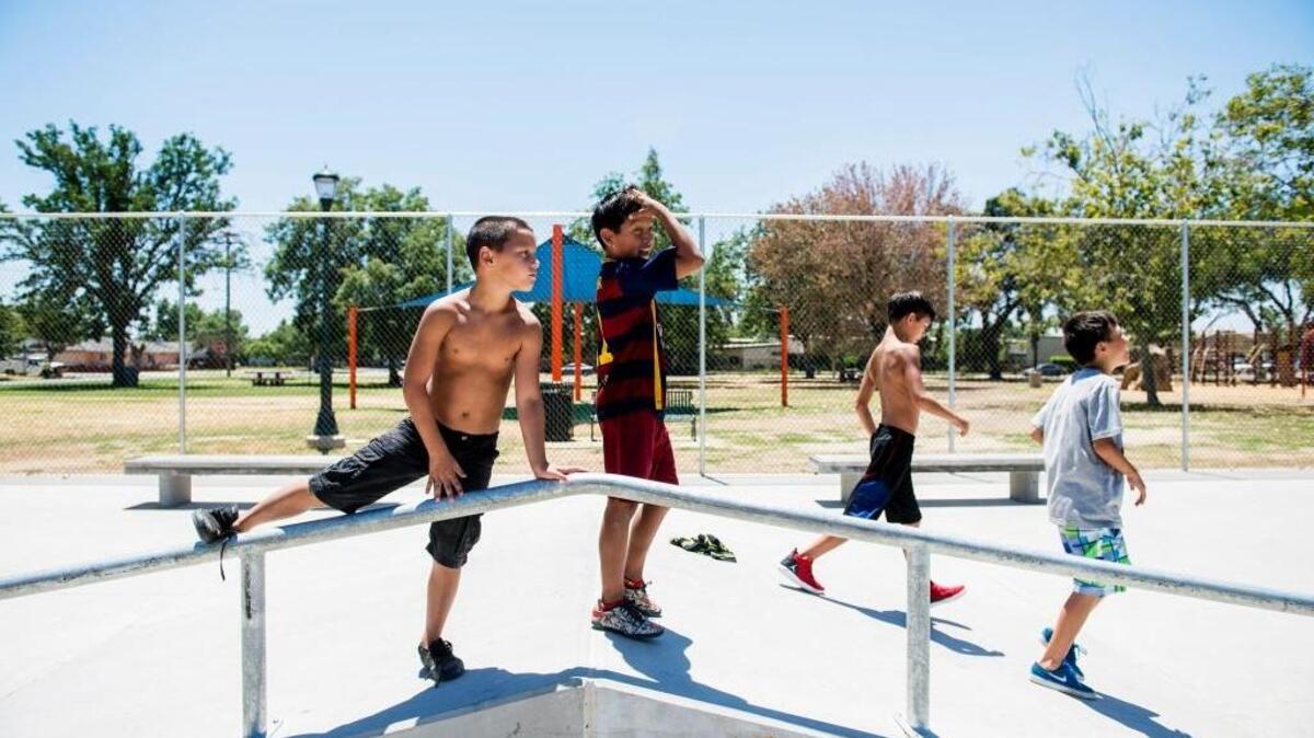 Children check out the new skate park at Stephen Leonard Park in Merced, Calif., Wednesday, July 6, 2016.