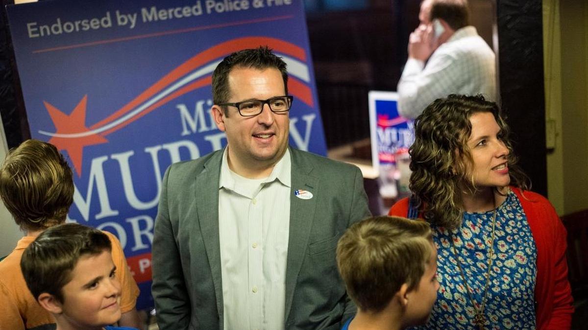 Merced mayoral candidate Mike Murphy, center with his wife Heather, right, and their children at his campaign party at Pinocchio’s Restaurant in Merced, Calif., Tuesday, Nov. 8, 2016.