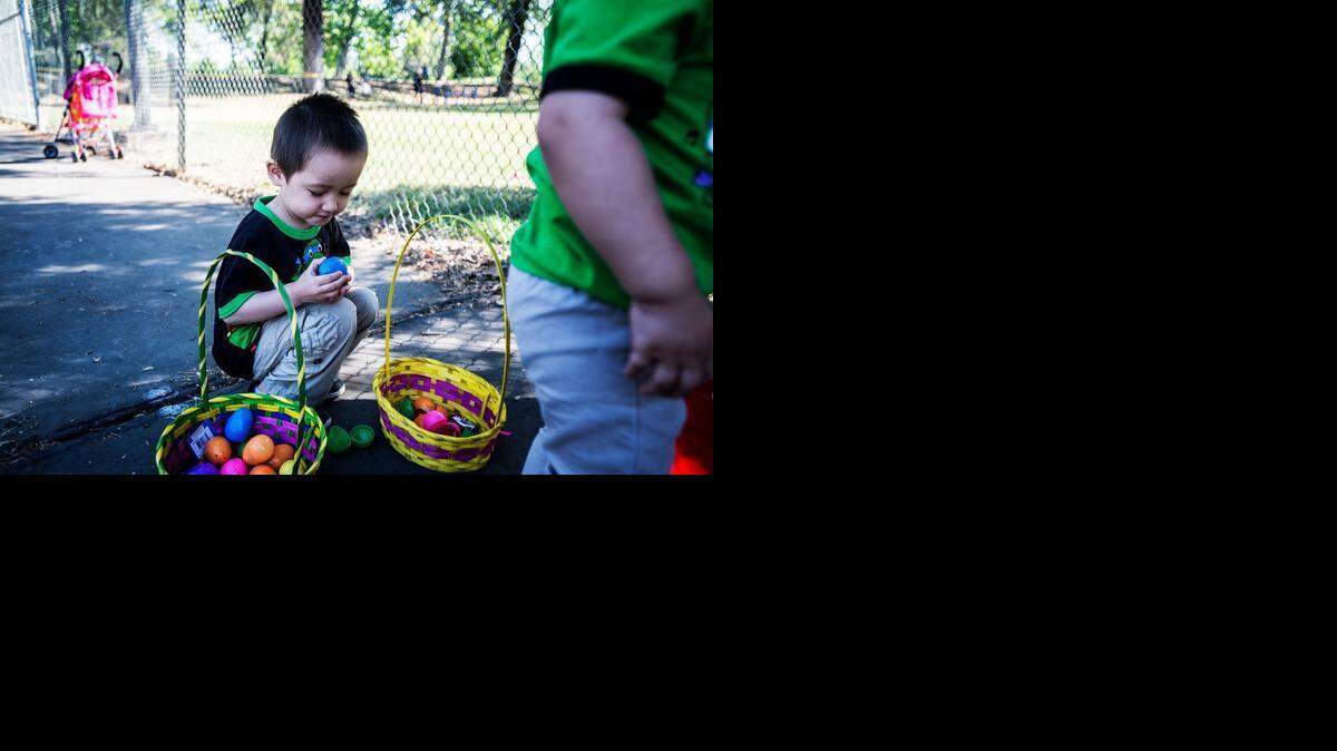 
Michael Rangel, 4, of Winton goes through baskets of Easter eggs during the 25th annual Kiwanis Club of Greater Merced Easter Egg Hunt at Applegate Park in Merced on Saturday. Merced Golden Valley and Livingston Key Club members filled thousands of plastic eggs with candy and receipts for prizes.

