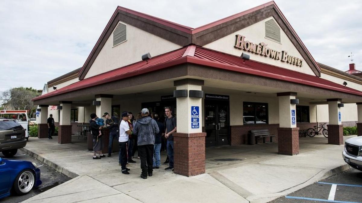 Hometown Buffet employees arrive to receive their paychecks at the Hometown Buffet restaurant located at 721 West Olive Avenue in Merced, Calif., Tuesday, March 8, 2016. The restaurant's parent company, Buffet LLC, filed for bankruptcy Monday, March 7, 2016.