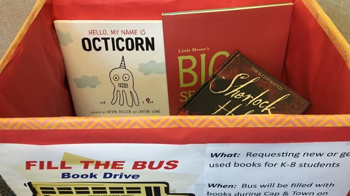 The Merced City School District book drive, part of a new reading initiative called “Aim High, Target Success,” will end Sept. 10 at the Cap & Town celebration in downtown Merced, where the district hopes to fill a school bus with books.