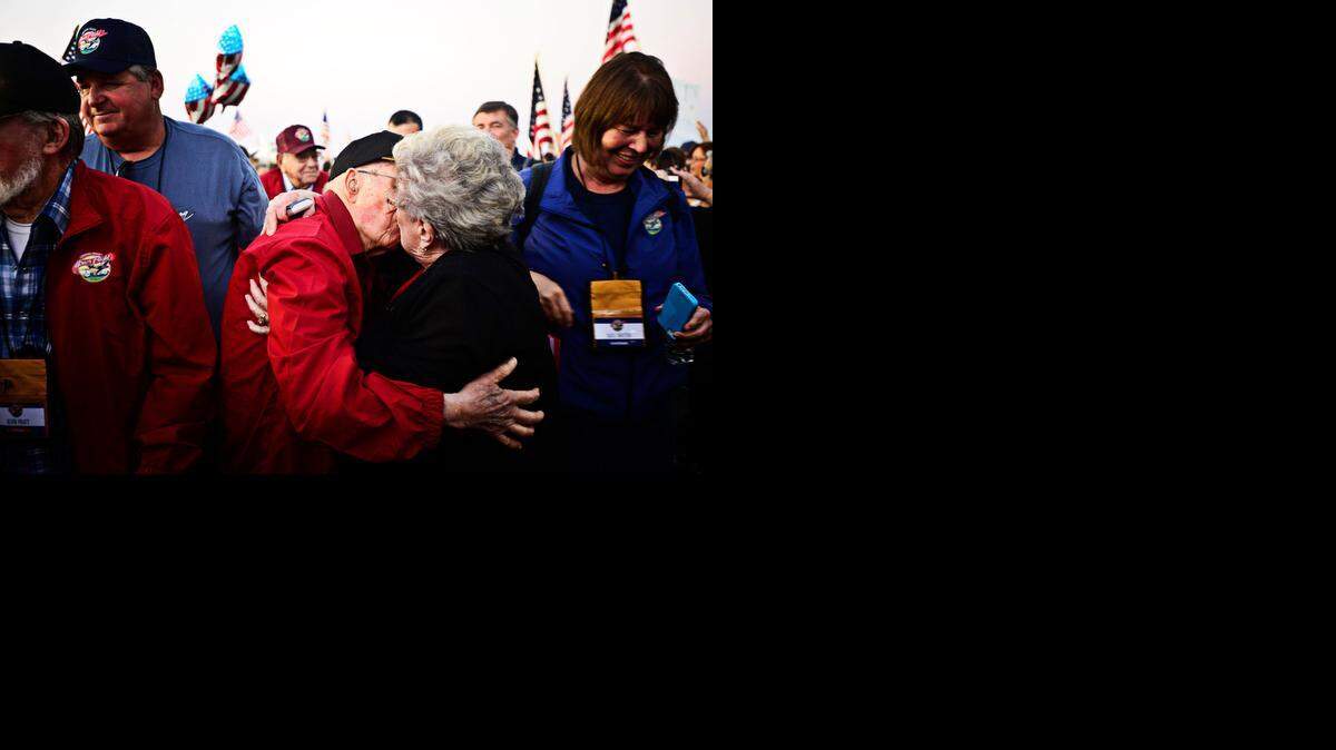 
Dan Child, 98, of Merced receives a welcome-home kiss from wife, Ellen, 84, upon returning from the Central Valley Honor Flight for World War II veterans at Castle Airport in Atwater on Oct. 29. The flight took over 70 veterans to Washington, D.C., to visit the World War II war memorial.
