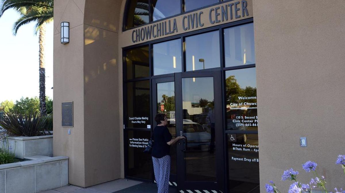 A woman enters the Chowchilla Civic Center on Tuesday, July 14, 2015, before a meeting of the City Council.