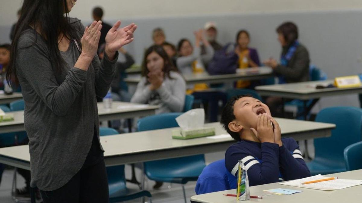 Burbank Elementary School sixth-grader Daniel Chen reacts to winning first place in the Merced County Office of Education’s fourth to sixth grade spelling bee Tuesday, Dec. 1, 2015, at Atwater Community Center.