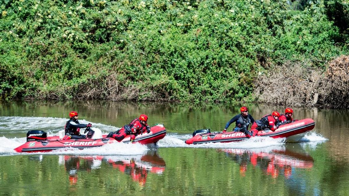 The Merced County Sheriff Water Rescue and Recovery unit continues to search the Merced River for a missing man near Hagaman Park in Stevinson, Calif., on Thursday, June 15, 2017. According to the Merced County Sheriff Department, Jose Castaneda, 36, of Stevinson, disappeared yesterday after saving his 3-year-old daughter from the Merced River.