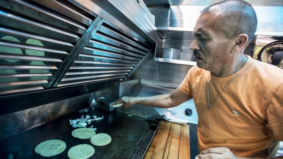 Ramon Sanchez, 55, owner of Ramon’s Tacos, prepares carne asada tacos inside his taco truck next to the El Campo Market on Highway 140 in Planada, Calif., on Friday, June 10, 2016. The taco truck is a popular stop for travelers on their way to and from Yosemite National Park.