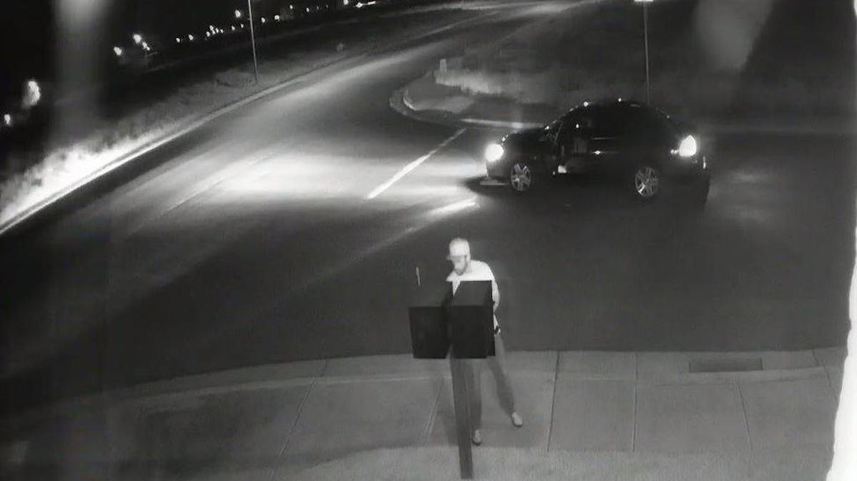 A suspect wearing a baseball cap and Adidas shirt was caught on surveillance footage stealing mail from the community mailbox for Olzack Healthcare Consulting and Providence Financial & Insurance Services in Atwater.