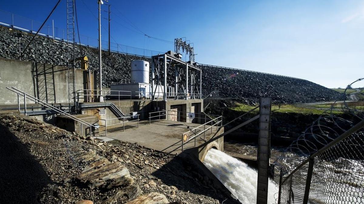 Water flows through the McSwain Dam in Snelling on Wednesday, Dec. 30, 2015. According to Bill Cochran, project manager of the Merced Irrigation District’s New Exchequer Hydroelectric Project, the McSwain powerhouse is capable of producing 10 megawatts of power.