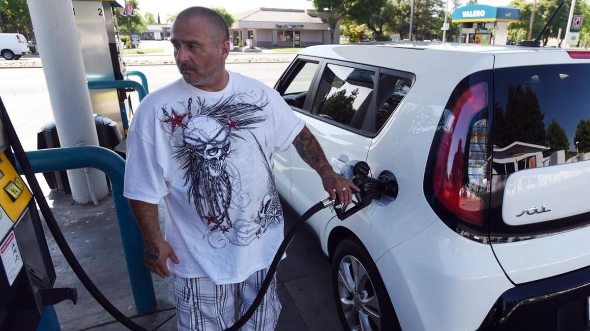 Richard Huerta, 44, of Merced pumps gas at Valero station on G Street on Monday, May 2, 2016. AAA says tightening gasoline supply and strong consumer demand are steadily pushing up gas prices throughout California.