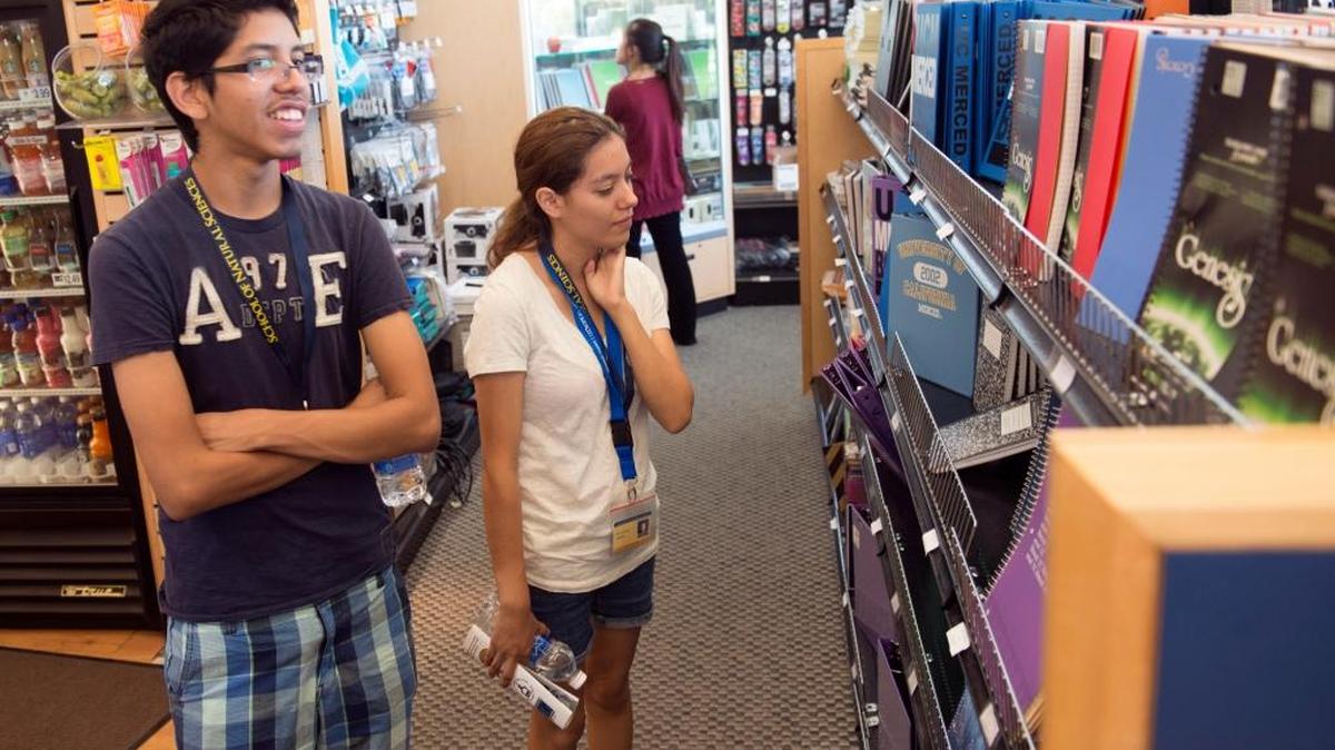 
Incoming freshmen Juan Rodriguez and Karla Mosqueda, both 17 and biology majors from Stockton, peruse the UC Merced bookstore Tuesday, the day before the fall semester starts. The university expects to have 6,700 students this semester.
