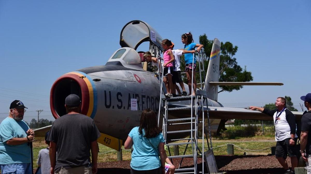 Hundreds of people lined up at the Castle Air Museum gates on Sunday May 28, 2017 for Open Cockpit Day, a day where the public has a chance to see the insides of military planes.