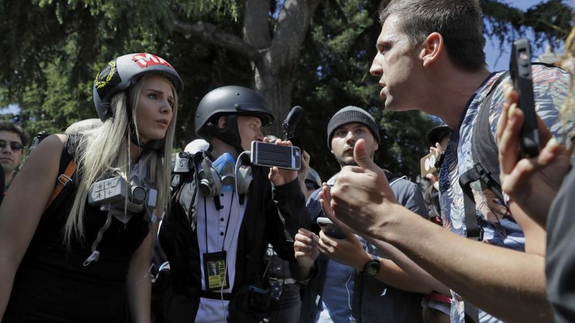 Demonstrators sharing opposing views argue during a rally to protest an alt-right speaker last April in Berkeley.