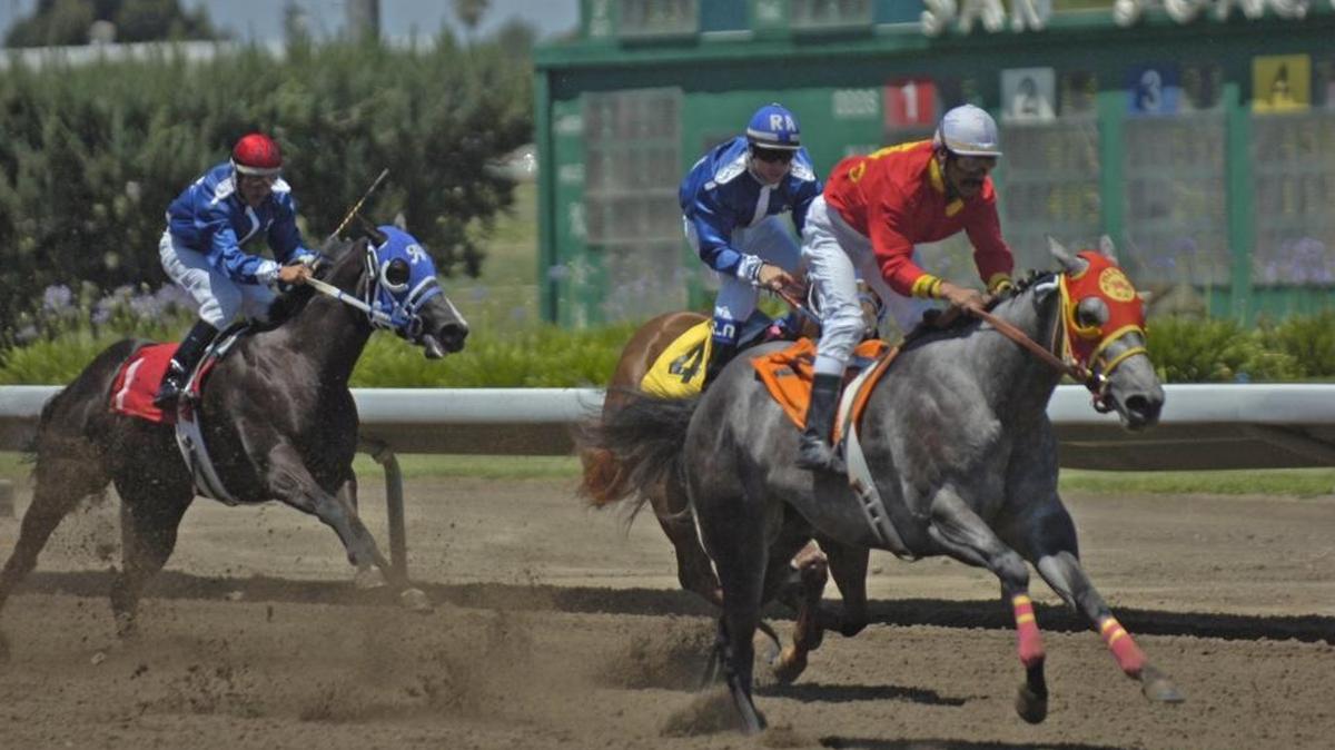 Horse racing has long been a staple at many county fairs, as pictured in 2007 at Stockton’s San Joaquin County Fair. The fair recently announced it will discontinue horse racing.