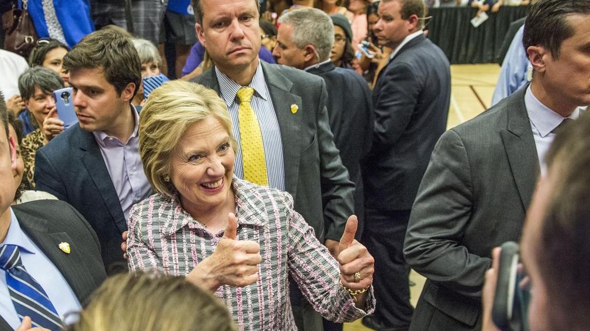 Hillary Clinton gives a thumbs-up to supporters after her campaign appearance at Sacramento City College on Sunday.