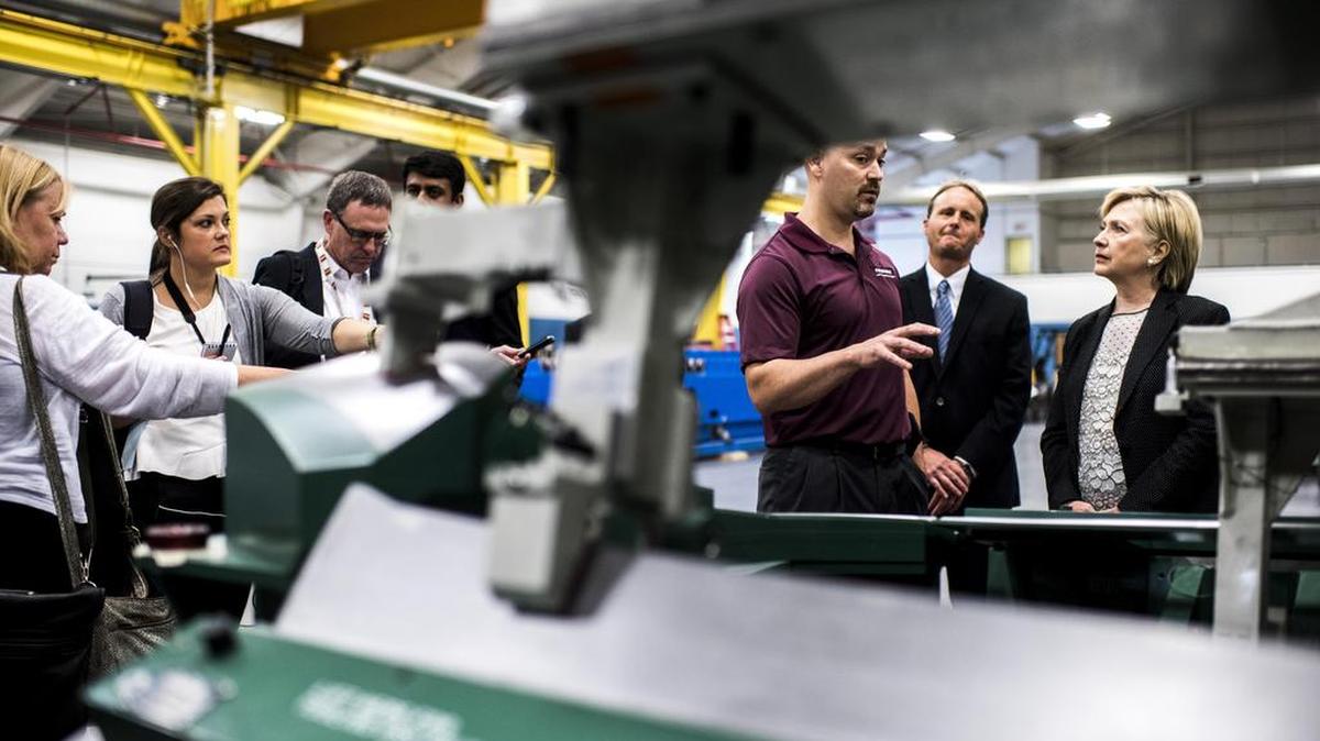 Hillary Clinton tours Futuramic Tool & Engineering in Warren, Mich. on Thursday, before delivering an economic policy speech.
