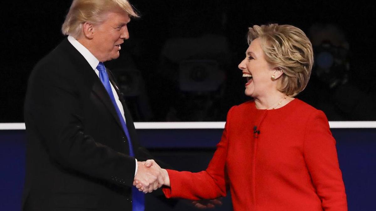 Republican presidential nominee Donald Trump shakes hands with Democratic presidential nominee Hillary Clinton after the presidential debate Monday evening at Hofstra University in Hempstead, N.Y.