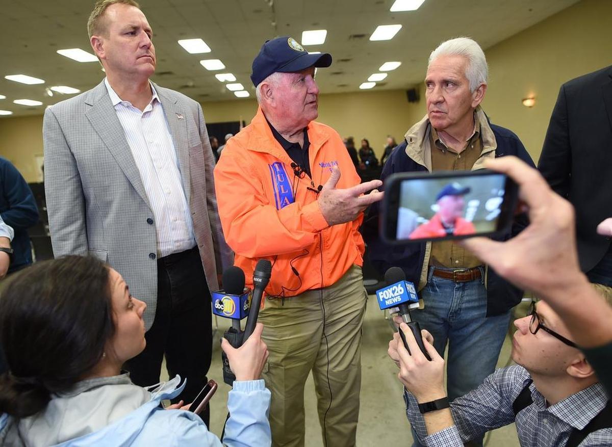 Sonny Perdue, US Ag Secretary, center, with Reps. Jeff Denham, left, and Jim Costa, answers a question during a press conferences after Perdue’s town hall meeting at the World Ag Expo.