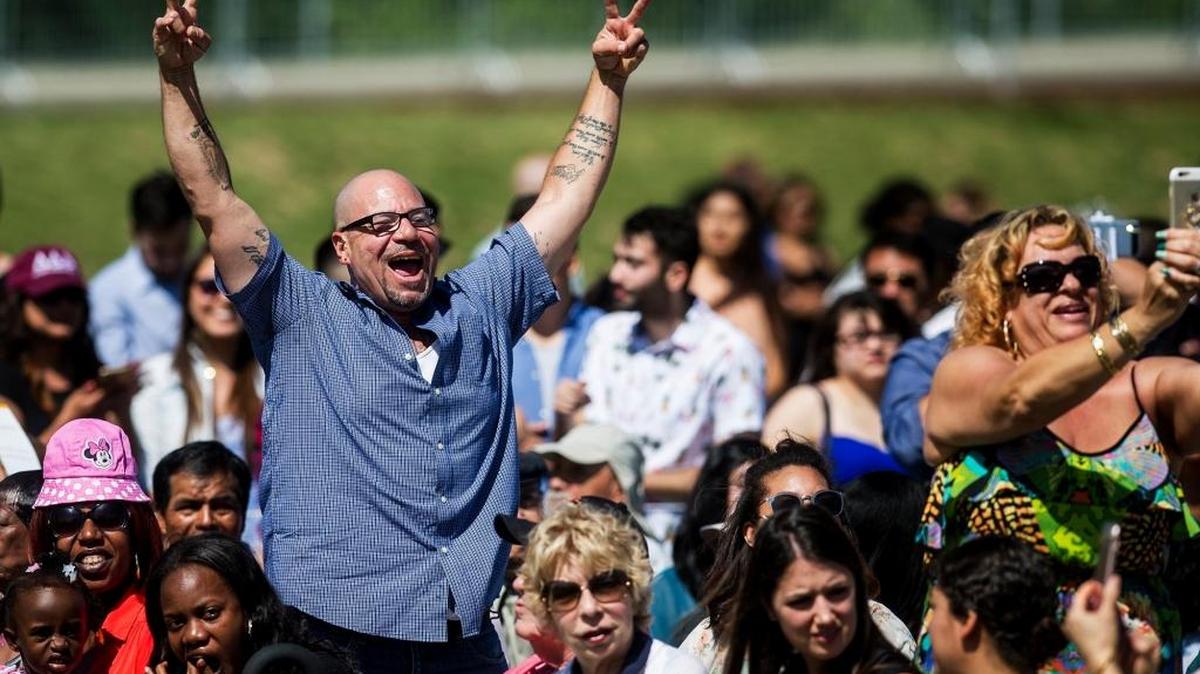 A proud father celebrates as his daughter crosses the stage to receive her diploma at UC Merced; the impacts of the GOP’s tax plans would be to make it nearly impossible for future graduates to attend grad school or pursue advanced degrees without more help from parents.