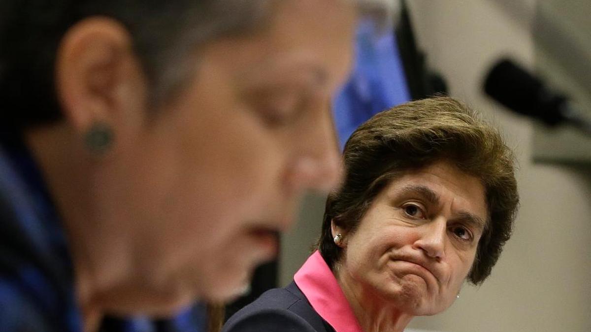 State Auditor Elaine Howle, right, looks over at UC President Jane Napolitano during Joint Legislative Audit Committee hearings in Sacramento last year. Howle’s office gained greater protection this year through a law signed this week by Gov. Jerry Brown.