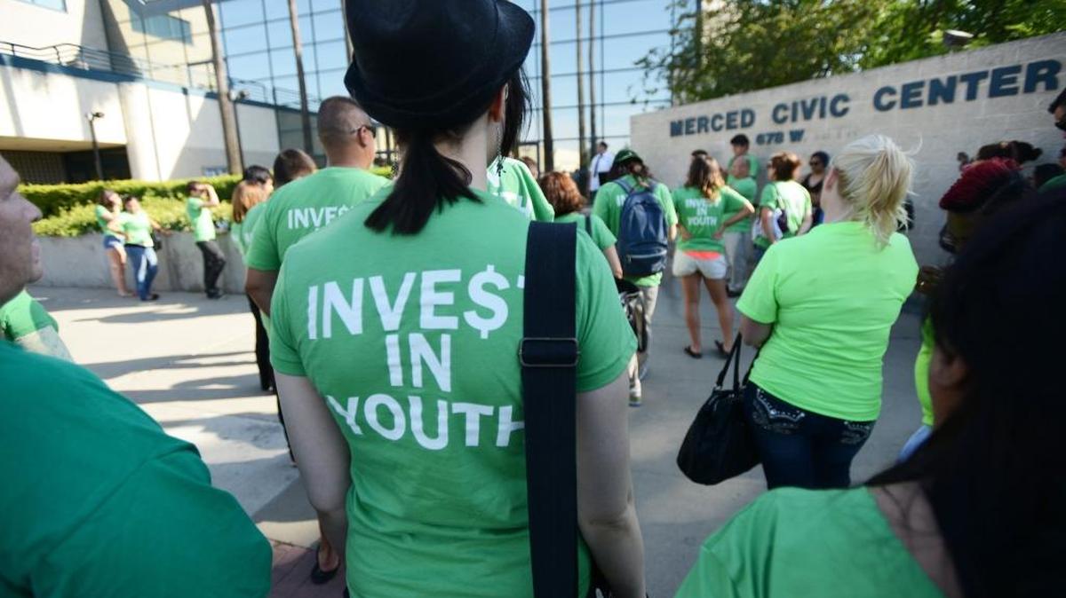 Young people rally outside City Hall in 2013 to ask for more spending on youth programs.