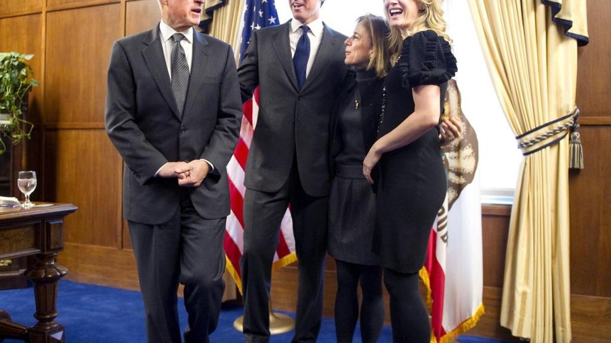 Gov. Jerry Brown is accompanied by his wife, Anne Gust Brown, as they pay a visit to Lt. Gov. Gavin Newsom and his wife Jennifer Siebel Newsom after both politicians were sworn in to office on Jan. 10, 2011. Newsom hopes to succeed Brown as governor.