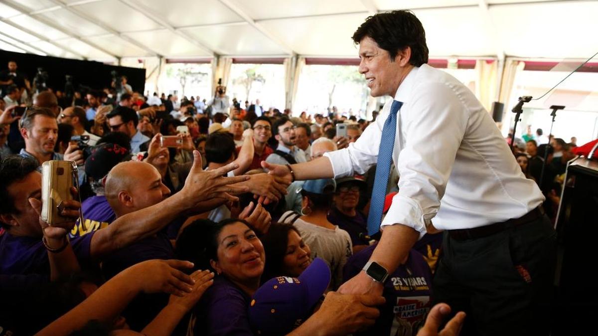 State Sen. Kevin de León shakes hands with supporters in October during an event to formally announce his run for U.S. Senate against incumbent Sen. Dianne Feinstein.