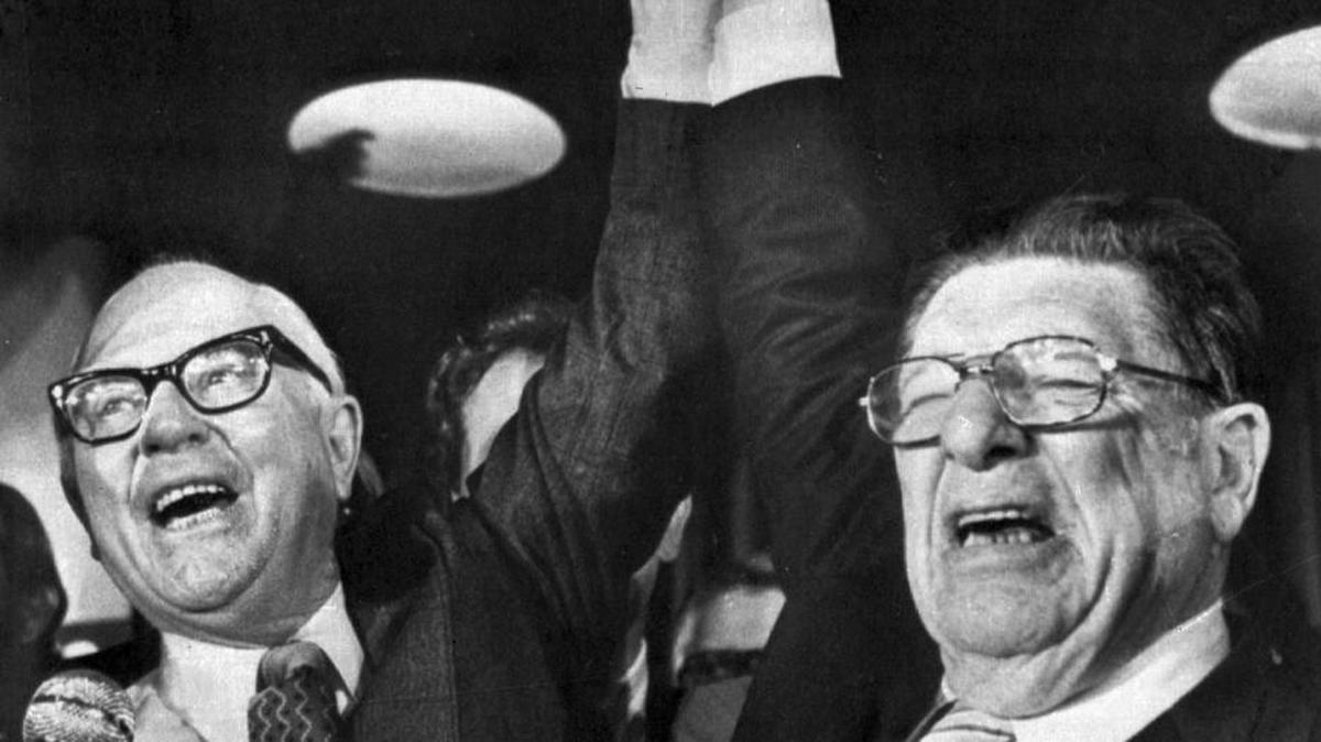 Paul Gann, left, and Howard Jarvis, hold up their hands on the night of June 7, 1978, as their co-authored initiative Proposition 13 took a commanding lead in the California primary. This year, California voters approved billions of dollars in new taxes, perhaps signaling that the tax revolt Jarvis and Gann launched may be over.