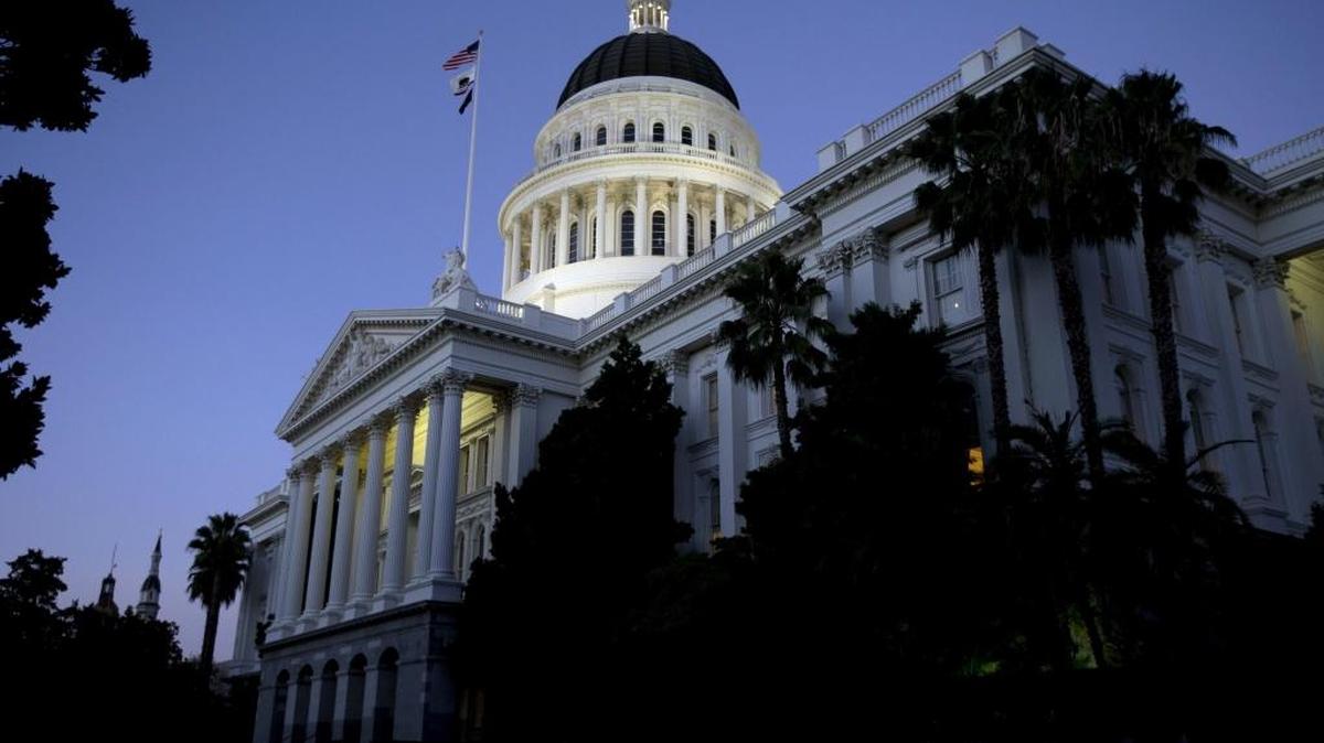 The California Capitol glows in an early Sacramento evening. With so many Democrats resigning or under fire for sexual misconduct, Republicans could regain a modicum of strength.