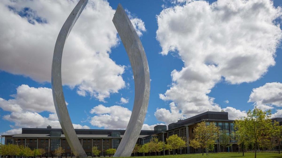 The campus sculpture titled “Beginnings” stands on the campus of UC Merced.