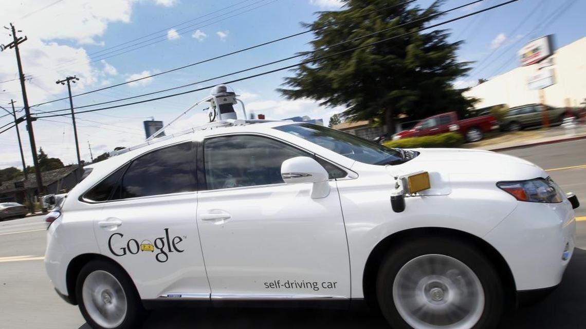 Google’s self-driving Lexus drives along street during a demonstration at Mountain View. But the real work of testing the self-driving software has been done at Atwater’s Castle Airport.